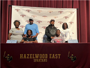 East Signing w Family 
